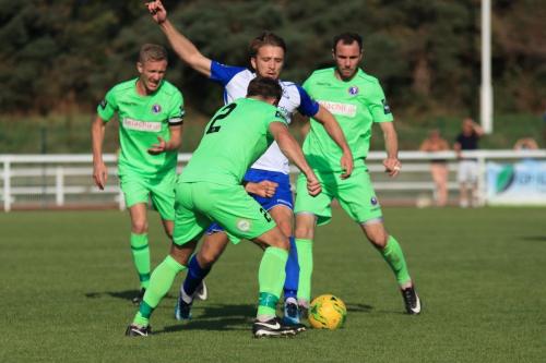 Enfields Remi Sutton runs at Ben Dyett (2)