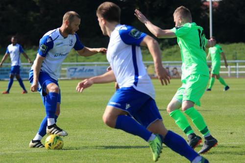 Enfields Sam Hatton (L) and Lewis Taaffe and Dorkings Tom Richards
