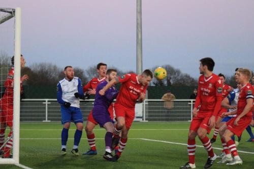 Aveleys Charlie Stimson half-clears the ball from a corner  The ball then ricocheted goalwards and was blocked on the line