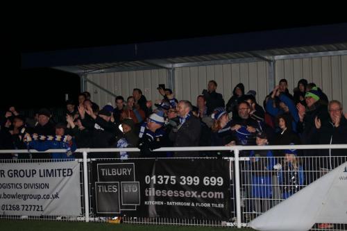Enfield fans celebrate at the final whistle