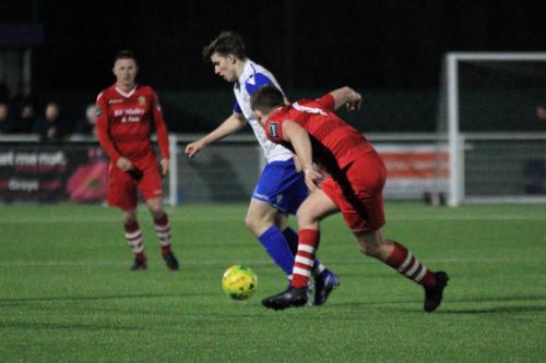 Enfields Josh Davison (white) and Hornchurchs Kenzer Lee