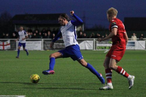 Enfields Sam Youngs (L) and Hornchurchs Alex Bentley