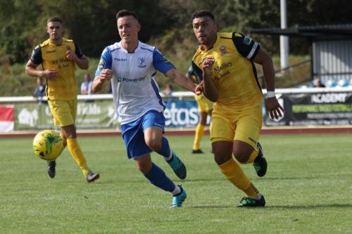 Enfields Brandon Adams (White) and Hornchurchs Nathan Cooper