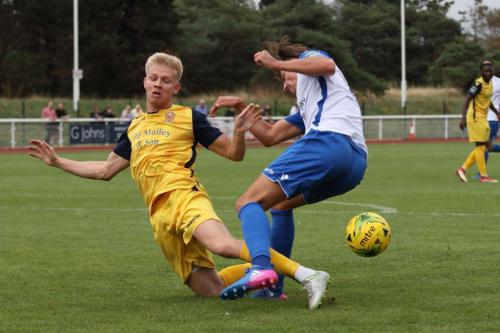 Hornchurchs Alex Bentley (L) and Enfields Sam Youngs