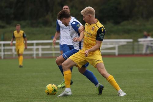 Hornchurchs Alex Bentley (R) challenges Lewis Taaffe