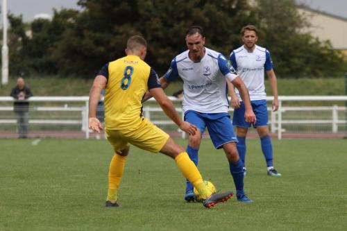 Hornchurchs Conor Hogan (L) and Enfields Matt Johnson