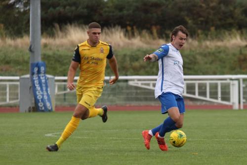 Hornchurchs Conor Hogan (L) and Enfields Sam Chaney
