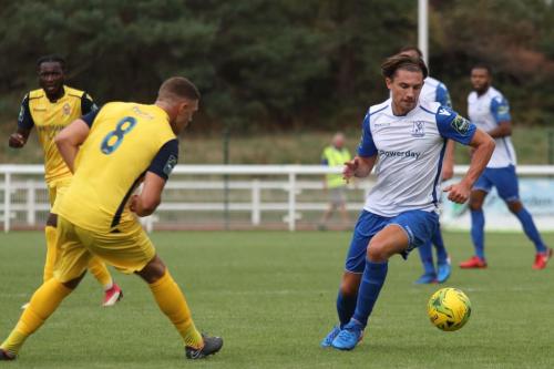 Hornchurchs Conor Hogan (L) and Enfields Sam Youngs