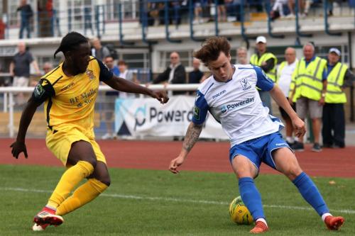 Hornchurchs Tobi Coker (L) and Enfields Sam Chaney