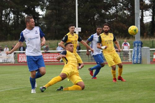 Liam Hope (R) puts Enfield 2-0 up
