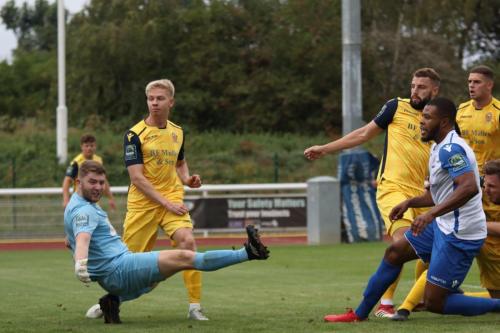 Taofiq Olomowewe (white shirt) puts Enfield 1-0 up