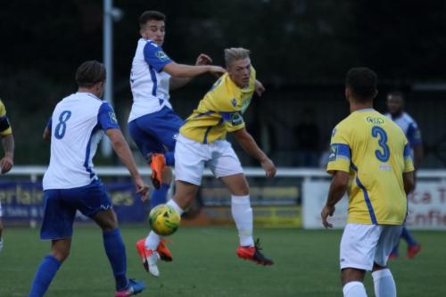 Enfields Bilal Sayoud (2nd L) challenges Alfie Mason