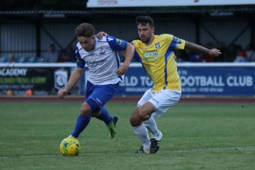 Enfields Lewis Taaffe (L) and Stortfords Sam Robbins
