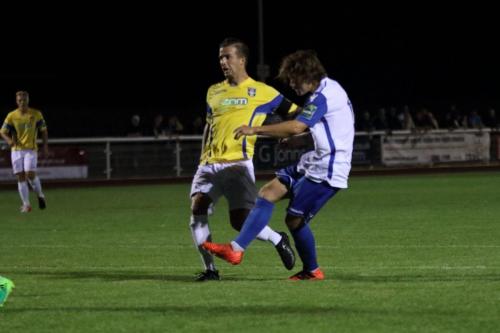 Enfields Sam Chaney (R) finishes a spectacular run by shooting just wide