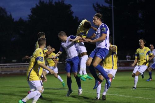 Enfields Sam Youngs (white, R) and Liam hope challenge at a set-piece