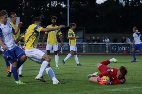 Stortford keeper Calum Kitscha smothers the ball