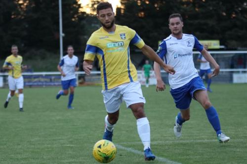 Stortfords Chris Gregan (L) and Enfields Liam Hope