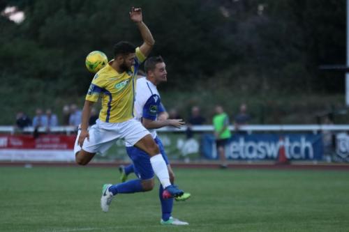 Stortfords Chris Gregan (L) and Enfields Liam Hopex