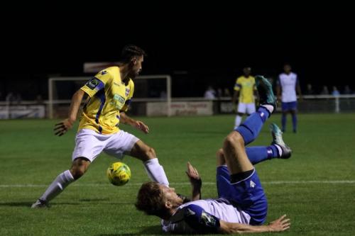 Stortfords Sam Robbins (L) and Enfields Remi Sutton