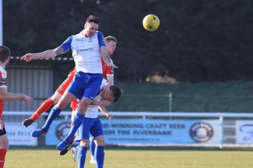 Enfields Matt Johnson wins a header