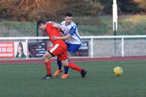 Folkestones Callum Davies (L) and Enfields Bilal Sayoud
