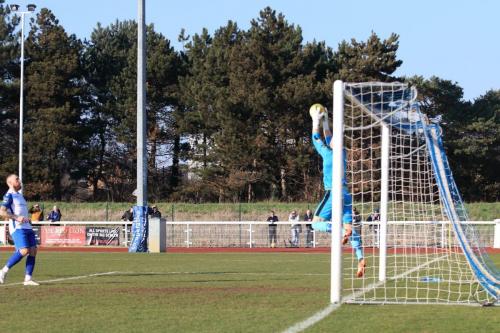 Folkestones Tim Roberts collects under his crossbar