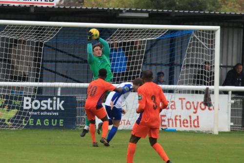 Enfield keeper Joe Wright collects a crossx