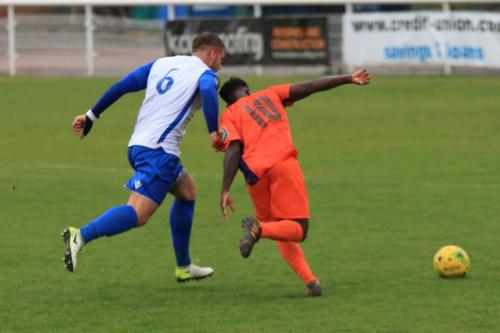Enfields Dan Rumens (L) and Wares Albert Adu