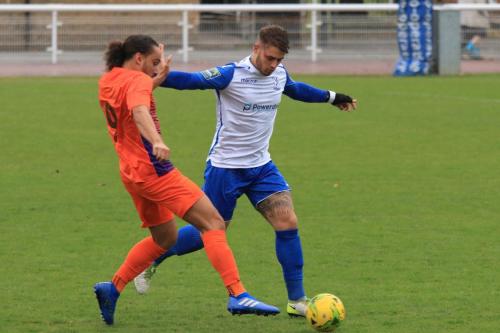 Enfields Dan Rumens (R) challenges Leigh Rose