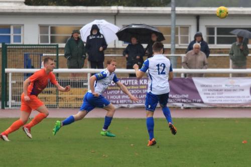 Enfields Josh Davison (12) heads the ball to fellow substitute Aaron Greene