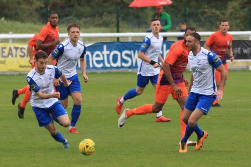 Enfields Matt Johnson (R) passes to Bilal Sayoud