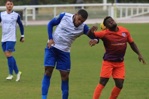 Enfields Taofiq Olomowewe (L) and Wares Albert Adu