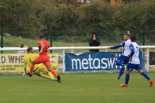 Ware keeper Harry Ricketts saves from Billy Bricknell