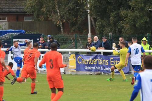 Ware keeper Harry Ricketts saves from Billy Bricknell who, I think, was flagged offside