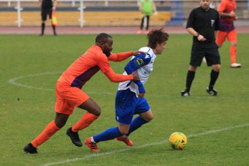 Wares Dom Njoya (L) and Enfields Sam Chaney