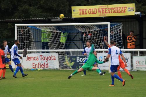 Wares Jack Devaney (I think) shoots over the bar as Joe Wright races out to narrow the angle