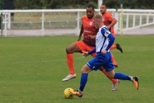Wares Junior Brown (L) challenges Ryan Blackman