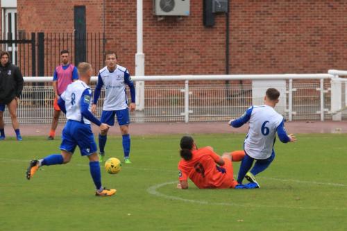 Wares Leigh Rose (9) is penalised for a late challenge on Enfields Dan Rumens