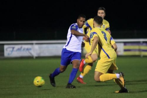 Enfields James Mulley (L) and Stortfords Chris Gregan