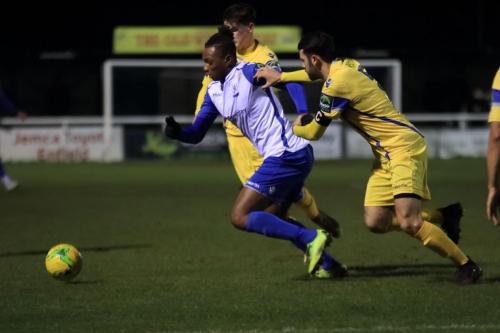 Enfields Karl Oliyide (L) and Stortfords Sam Robbins