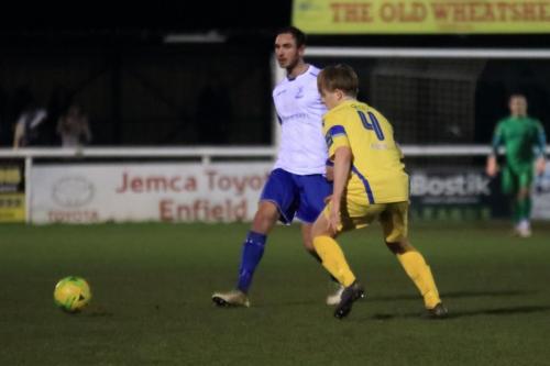 Enfields Matt Johnson (L) and Stortfords Alex Warman