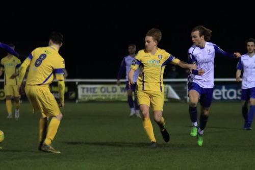 Enfields Mickey Parcell and Stortfords Jack Thomas (8) and Alex Warman