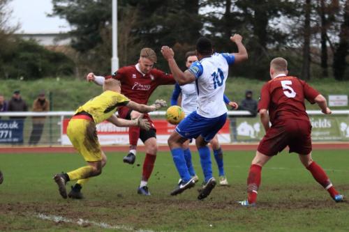Bognor keeper Petar Durin saves from Kezie Ibe (10)