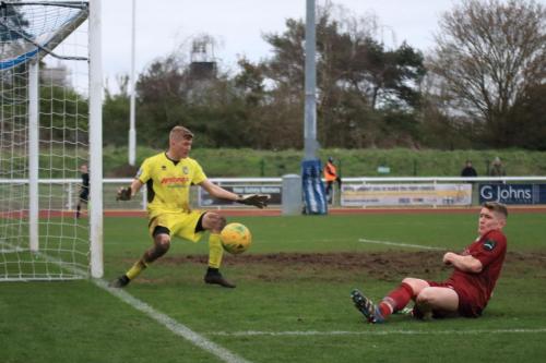 Bognors Chad Field (R) deflects a cross out of play for a corner