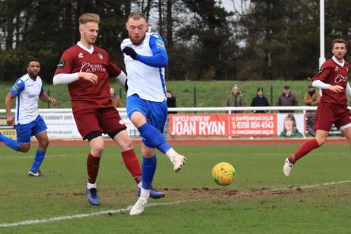 Enfields Billy Bricknell shoots across goal
