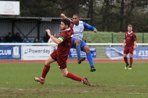 Enfields James Mulley shoots past the block of Harvey Whyte but the ball is blocked by another defender