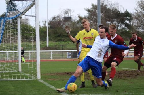 Enfields Matt Johnson keeps the ball from going out of play