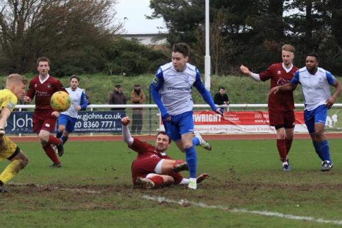 Enfields Sam Chaney (white) makes it 2-2