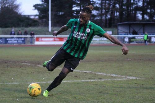 Burgess Hills Boris Kipeya-Bonno clears for a corner