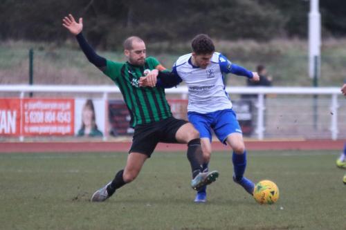 Burgess Hills Dan Beck (L) challenges Bilal Sayoud
